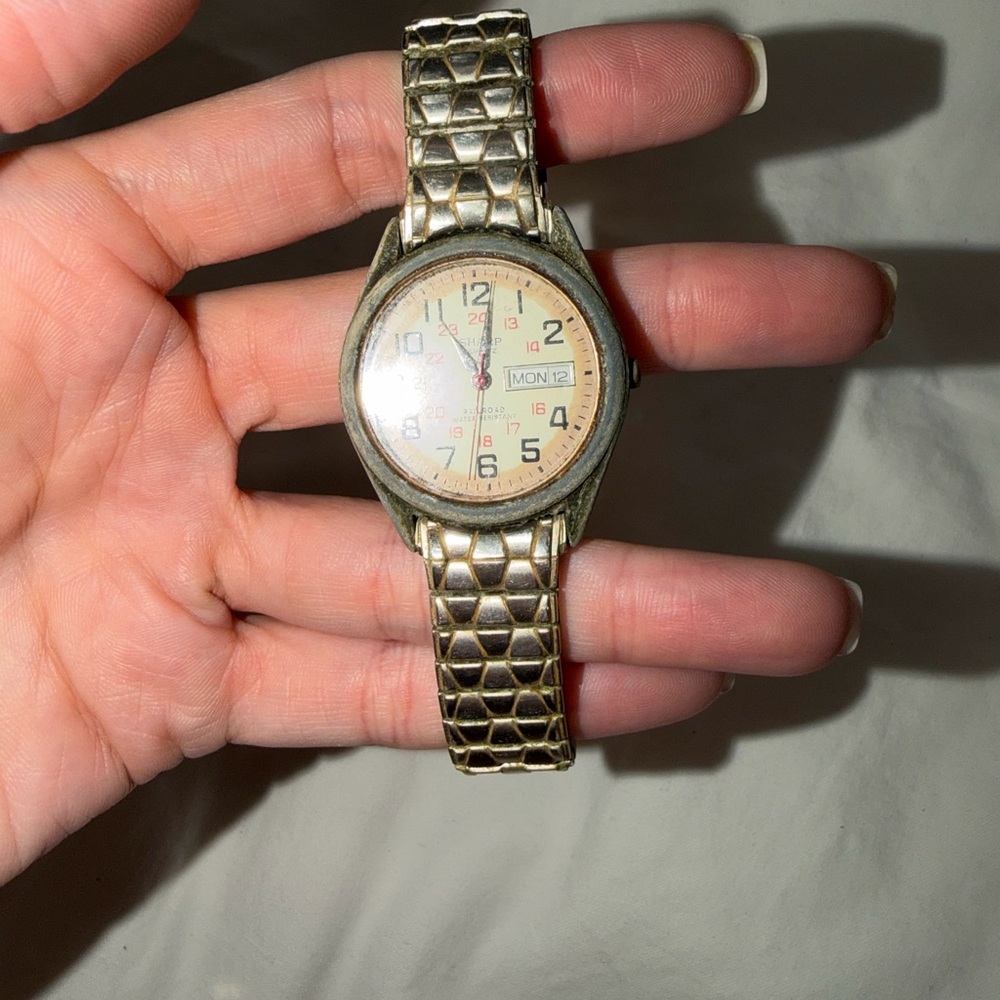 Gold Tone Analog Watch with Day/Date Display